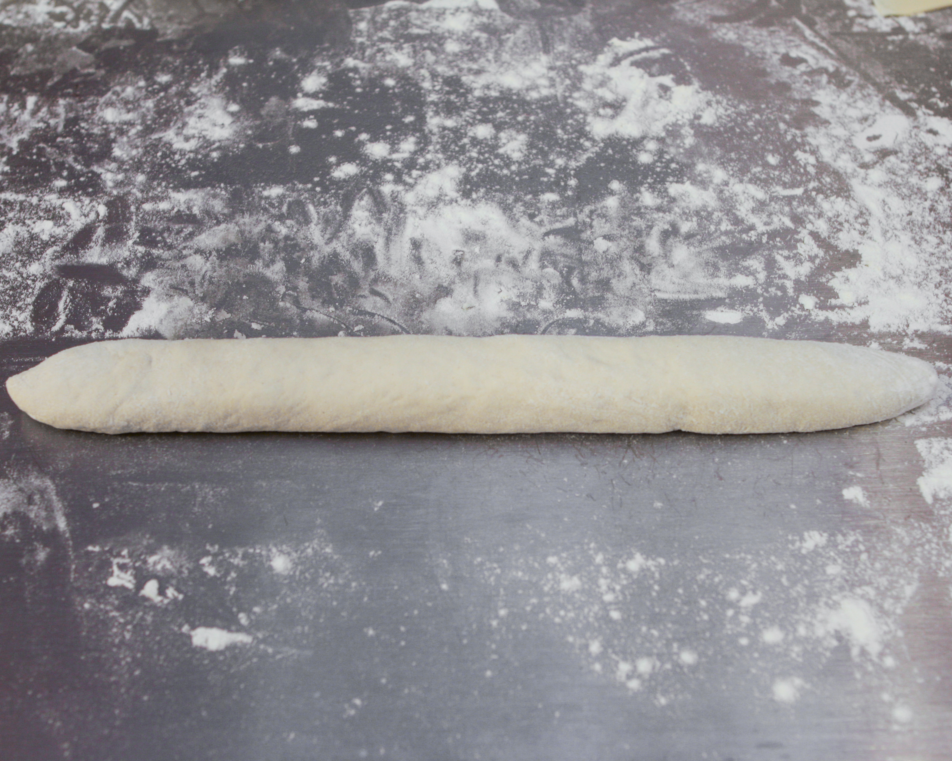 Roll baguette to length of 